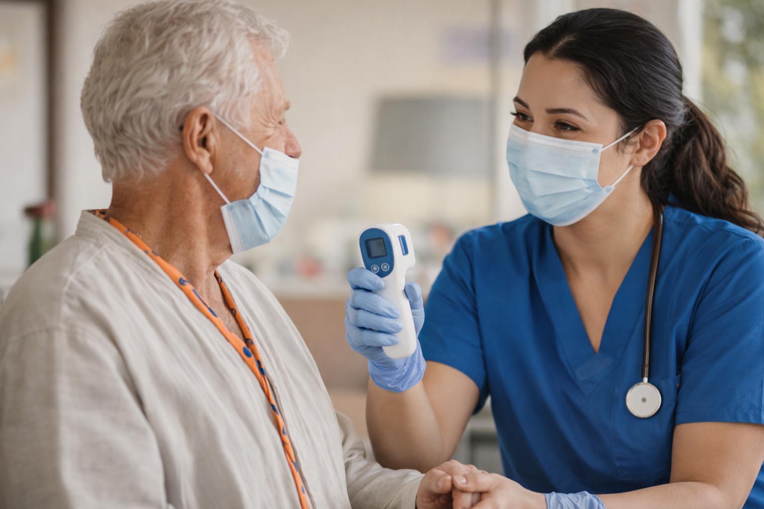 Nurse with senior patient who has an infectious disease, both wearing masks.  Nurse is holding a test to see if the patient is still sick.